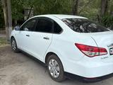 Nissan Almera 2014 года за 3 450 000 тг. в Актобе – фото 4