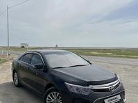 Toyota Camry 2014 года за 10 500 000 тг. в Атырау