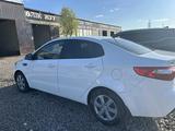 Kia Rio 2013 года за 4 700 000 тг. в Актобе – фото 3