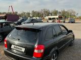 Mazda 323 1999 годаүшін1 200 000 тг. в Алматы