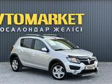 Renault Sandero 2016 года за 4 300 000 тг. в Актобе – фото 2