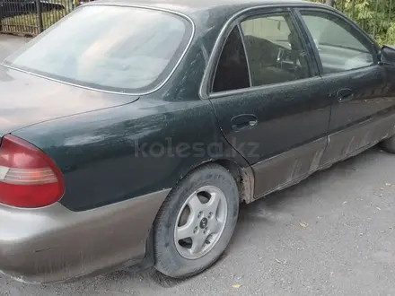 Hyundai Sonata 1998 года за 600 000 тг. в Караганда – фото 6