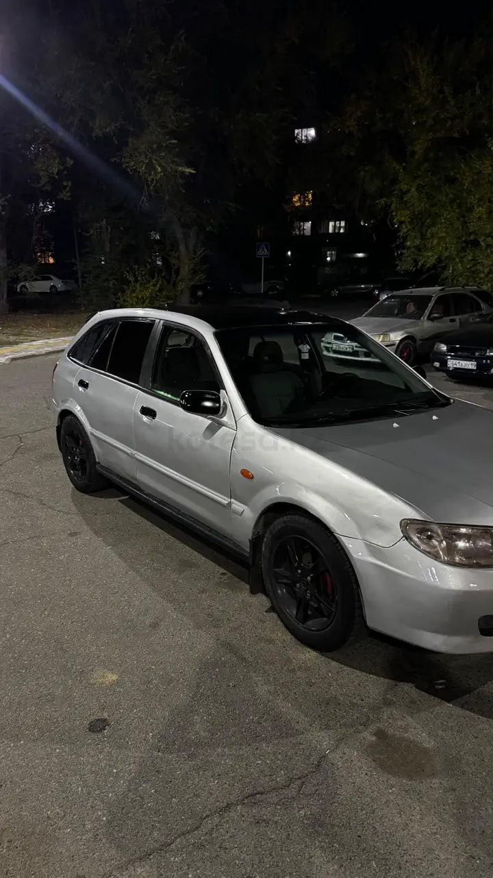 Mazda 323, 2003