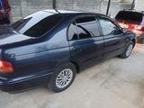 Toyota Carina E 1997 года за 1 800 000 тг. в Шымкент – фото 3