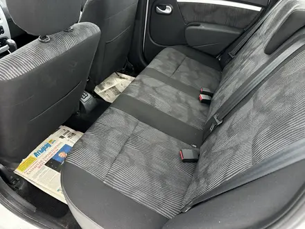 Renault Logan 2014 года за 3 250 000 тг. в Атырау – фото 10