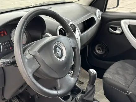Renault Logan 2014 года за 3 250 000 тг. в Атырау – фото 14