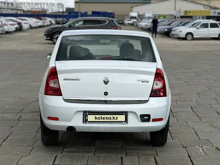 Renault Logan 2014 года за 3 250 000 тг. в Атырау – фото 4