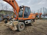 Doosan  DX210W 2014 года за 31 800 000 тг. в Астана