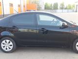 Kia Rio 2012 года за 3 800 000 тг. в Атырау – фото 4