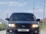 Mazda 323 2002 года за 2 600 000 тг. в Атырау – фото 3