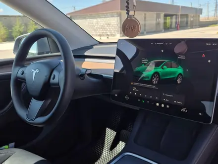 Tesla Model Y 2023 года за 22 500 000 тг. в Алматы – фото 14