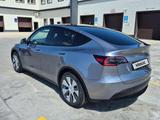 Tesla Model Y 2023 года за 22 500 000 тг. в Алматы – фото 4
