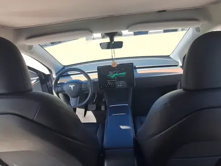 Tesla Model Y 2023 года за 22 500 000 тг. в Алматы – фото 35