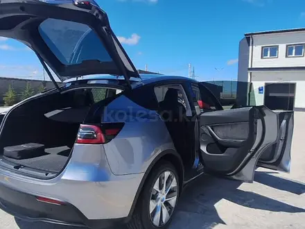 Tesla Model Y 2023 года за 22 500 000 тг. в Алматы – фото 38