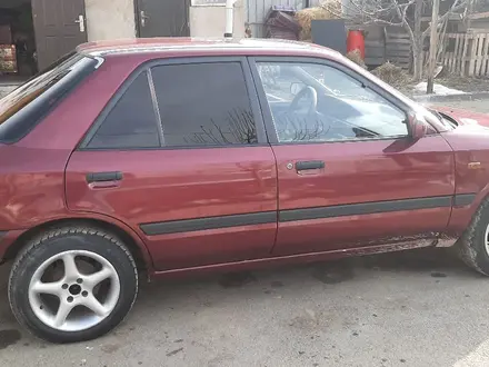 Mazda 323 1994 года за 1 250 000 тг. в Алматы – фото 4