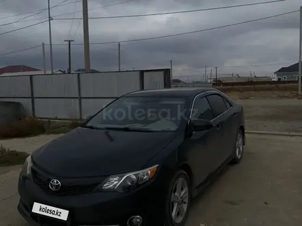 Toyota Camry 2013 года за 6 000 000 тг. в Атырау