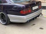 Задний бампер тюнинг обвес с диффузором для w210 AMG e55 за 80 000 тг. в Алматы