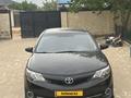 Toyota Camry 2014 года за 4 800 000 тг. в Жанаозен