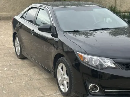 Toyota Camry 2014 года за 4 800 000 тг. в Жанаозен – фото 2
