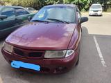 Mitsubishi Carisma 1996 годаүшін1 200 000 тг. в Алматы