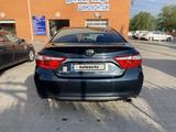 Toyota Camry 2015 годаfor7 700 000 тг. в Актобе – фото 5