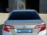 Toyota Camry 2012 года за 8 690 000 тг. в Жанаозен – фото 4