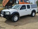 Nissan NP300 2011 года за 3 900 000 тг. в Актобе – фото 2