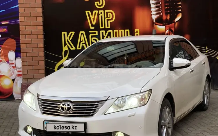 Toyota Camry 2014 года за 10 200 000 тг. в Атырау