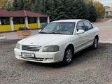Kia Optima 2002 года за 1 100 000 тг. в Караганда – фото 2