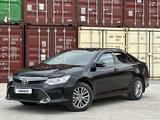 Toyota Camry 2015 года за 11 200 000 тг. в Астана