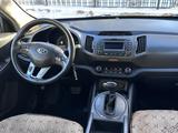 Kia Sportage 2012 года за 7 300 000 тг. в Актобе – фото 4