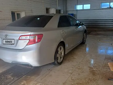 Toyota Camry 2014 года за 6 200 000 тг. в Актау