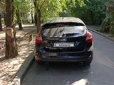 Ford Focus 2014 года за 2 590 000 тг. в Алматы – фото 5