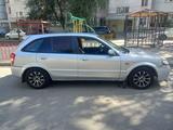 Mazda 323 2002 годаүшін1 600 000 тг. в Алматы – фото 4