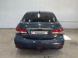 Nissan Almera 2014 года за 2 063 333 тг. в Астана – фото 4