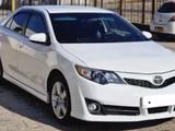 Toyota Camry 2013 года за 9 000 000 тг. в Жанаозен