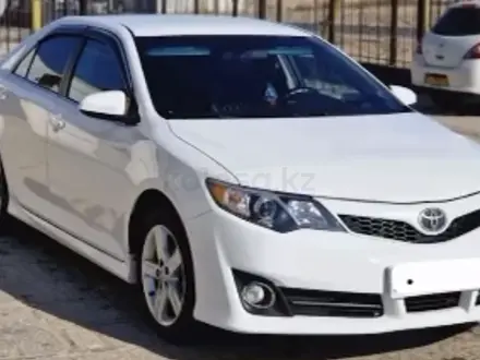 Toyota Camry 2013 года за 9 000 000 тг. в Жанаозен