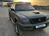 Mitsubishi L200 2006 годаүшін3 700 000 тг. в Тараз