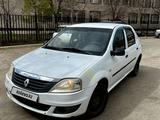 Renault Logan 2012 года за 1 800 000 тг. в Актобе – фото 2