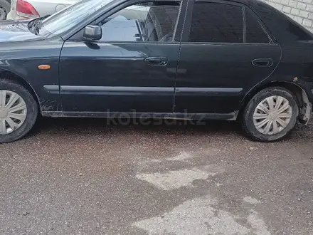 Mazda 626 1998 года за 1 400 000 тг. в Актобе – фото 4