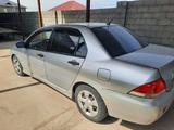 Mitsubishi Lancer 2004 года за 1 300 000 тг. в Шымкент – фото 2