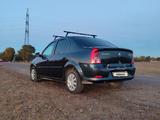 Renault Logan 2010 года за 1 900 000 тг. в Караганда – фото 2