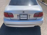 Mazda Eunos 800 1996 года за 1 400 000 тг. в Астана – фото 2