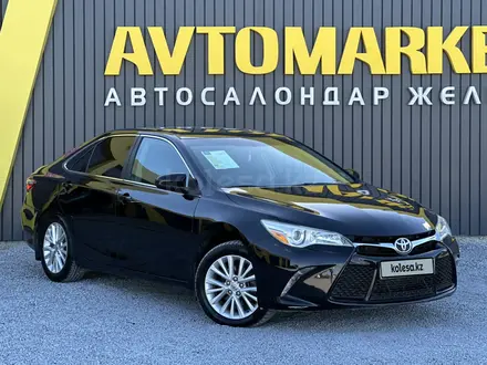 Toyota Camry 2015 года за 8 000 000 тг. в Актобе – фото 2