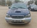 Kia Carnival 2001 года за 1 300 000 тг. в Байконыр