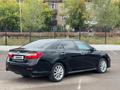 Toyota Camry 2014 года за 10 500 000 тг. в Караганда – фото 4