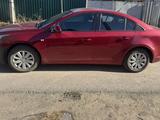 Chevrolet Cruze 2013 года за 3 100 000 тг. в Караганда – фото 2