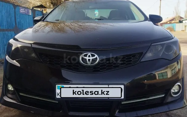 Toyota Camry 2014 года за 9 800 000 тг. в Караганда