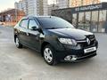 Renault Logan 2016 года за 4 300 000 тг. в Атырау – фото 2