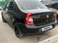 Renault Logan 2010 года за 1 350 000 тг. в Астана – фото 4